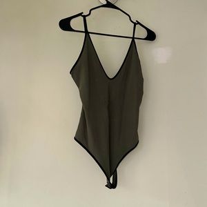 Express green and black body suit
